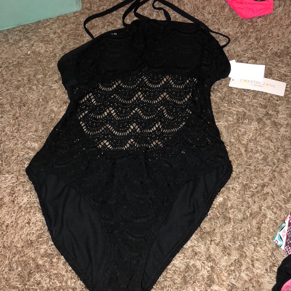 Black one piece swim suit. NWT